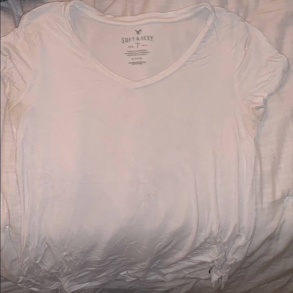 White top slightly see through